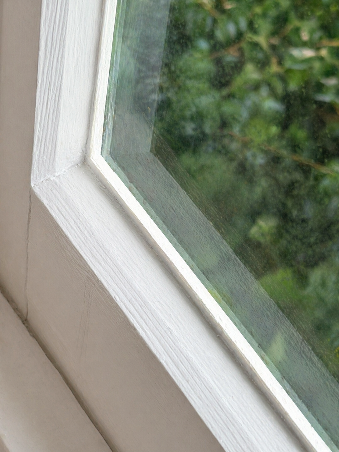 Window glass and frame before detailed cleaning